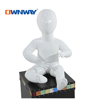 Window Display Boy and girl sitting child kids baby mannequin